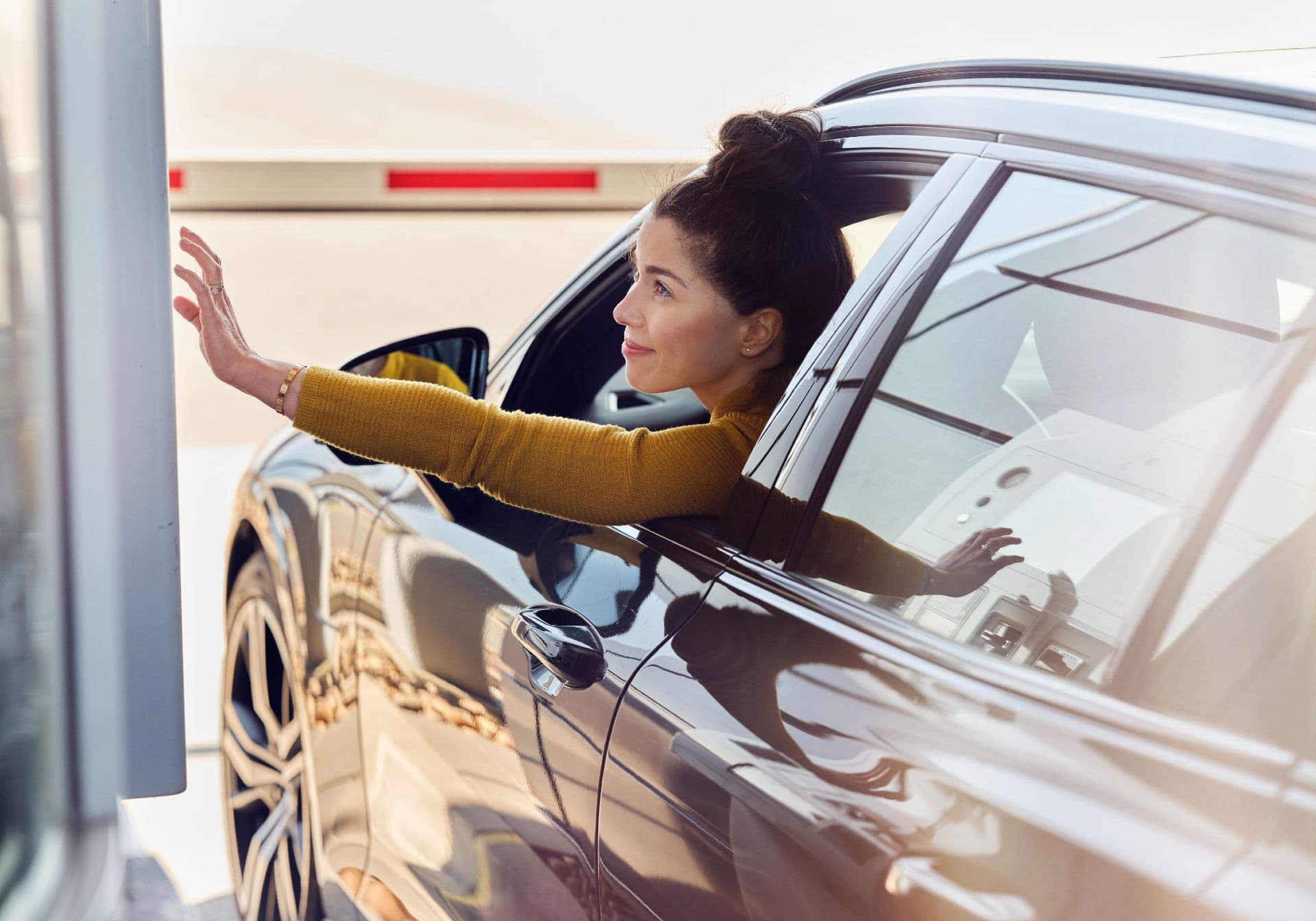Woman checking in in Scandlines harbour in automated lane
